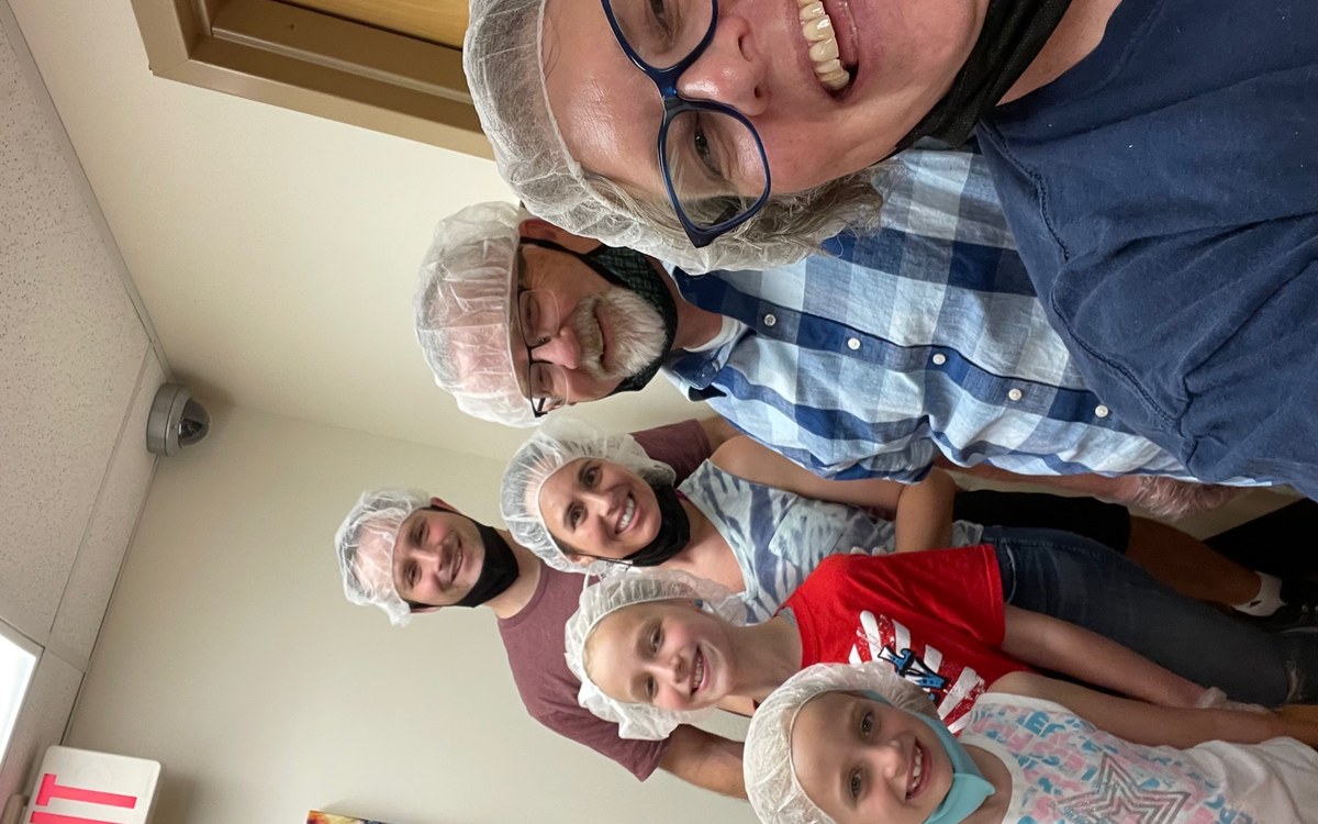 A volunteer meal group at Our Saviour's Housing