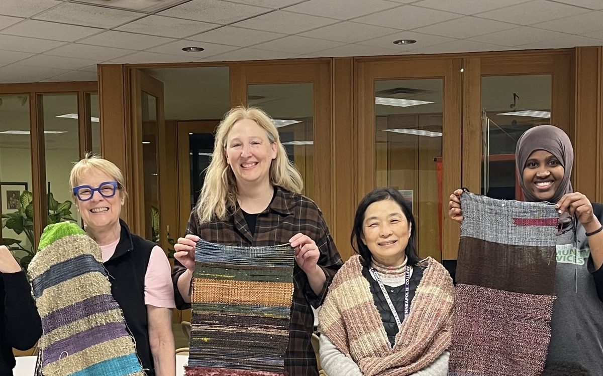 English Learning Center staff with handmade weaving projects