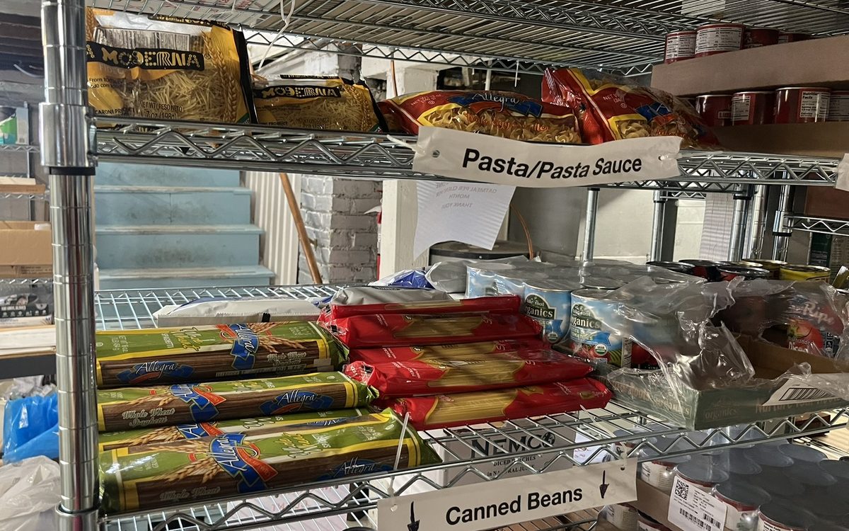 Donated food on the shelves at Our Saviour's Housing