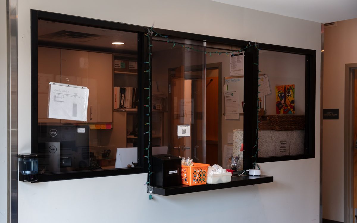 The shelter office window, with the grievance form and the grievance box