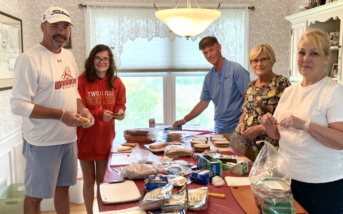 Volunteers preparing food at Our Saviour's Community Services